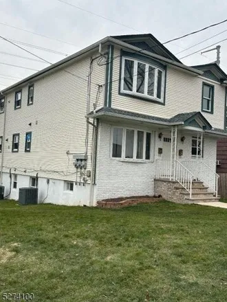 Rent this 3 bed house on 201 Cristiani Street in Roselle, NJ 07203