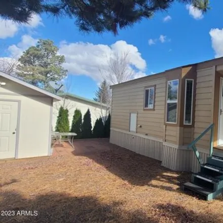 Buy this studio apartment on 2206 Wrangler Way in Overgaard, Navajo County