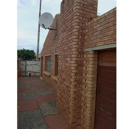 Rent this 3 bed apartment on Mapengo Street in Mofolo, Soweto