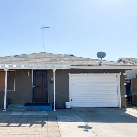 Buy this 4 bed house on 4136 East Lane Avenue in Fresno, CA 93702