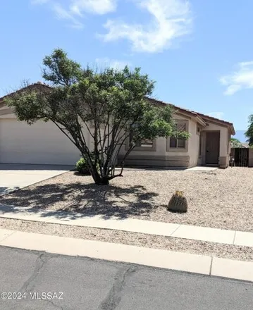 Rent this 3 bed house on 12406 North Globe Mallow Place in Marana, AZ 85658