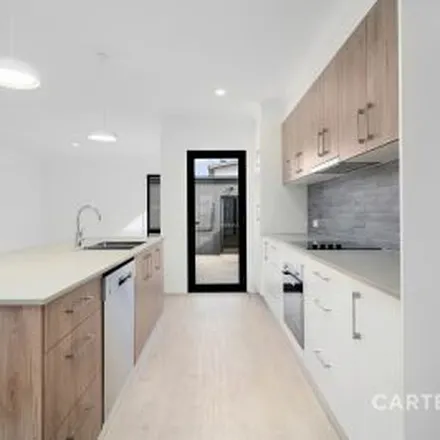 Rent this 4 bed apartment on Australian Capital Territory in 97 Tredwell Street, Strathnairn 2615