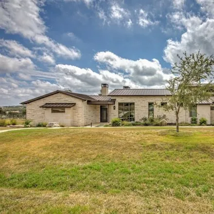 Buy this 5 bed house on 17114 Whispering Breeze Drive in Travis County, TX 78738