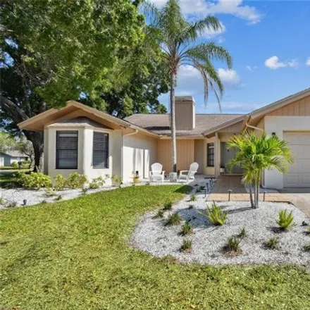 Buy this 3 bed house on 1011 Ridge Dr in Palm Harbor, Florida
