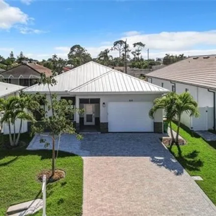 Buy this 4 bed house on 832 100th Avenue North in Collier County, FL 34108