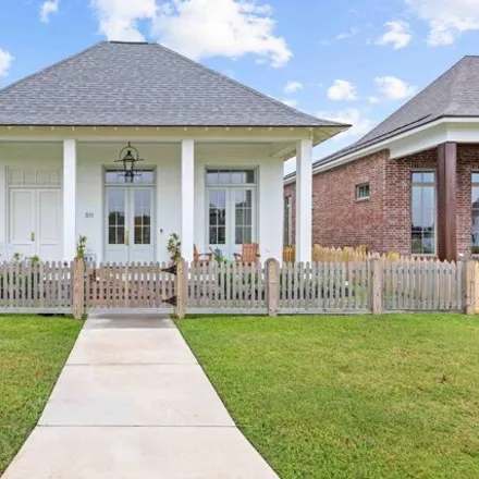 Buy this 4 bed house on 311A Villager Ave in Scott, Louisiana