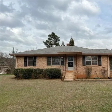 Rent this 3 bed house on 5009 Lower Roswell Road Southeast in Cobb County, GA 30068