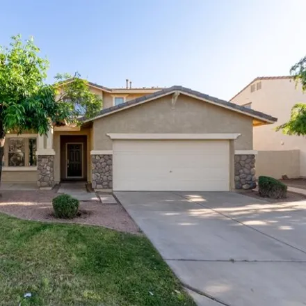 Rent this 4 bed house on 1365 East Strawberry Drive in Gilbert, AZ 85298