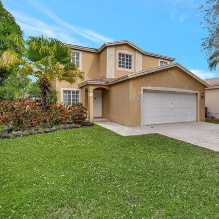 Rent this 4 bed house on 1294 Southwest 46th Way in Lakeview, Deerfield Beach
