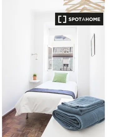 Rent this 7 bed room on Rua de Arroios 22 in 1150-056 Lisbon, Portugal