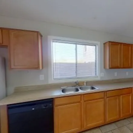 Rent this 3 bed apartment on 23774 West Desert Bloom Street in Sundance, Buckeye