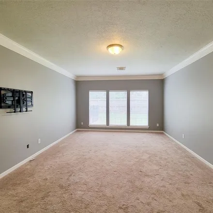 Rent this 4 bed apartment on 5633 Olympiad Drive in Harris County, TX 77041