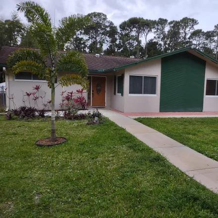 Rent this 3 bed house on 8422 Palomino Drive in Palm Beach County, FL 33467