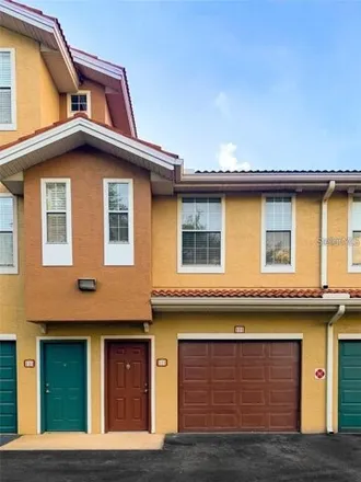 Rent this 3 bed townhouse on 12012 Villanova Drive in Hunter's Creek, Orange County