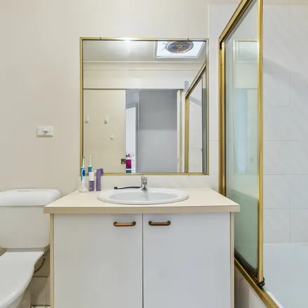 Rent this 3 bed townhouse on 2-10 Coolgardie Street in Elanora QLD 4221, Australia