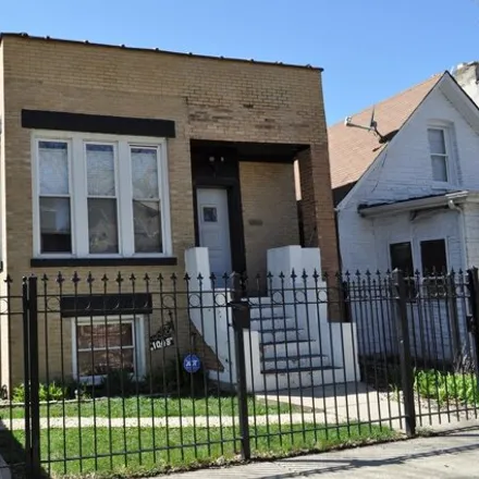 Buy this 6 bed house on 1029 North Ridgeway Avenue in Chicago, IL 60651