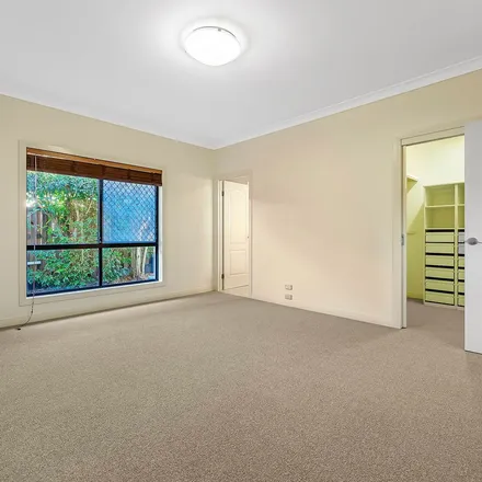 Rent this 4 bed apartment on Mitaro Rise in Pacific Pines QLD 4212, Australia