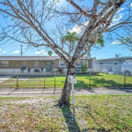 Buy this 4 bed house on 18011 Northwest 44th Avenue in Miami Gardens, FL 33055
