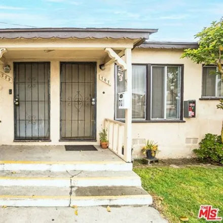 Buy this 6 bed house on 711 McDonald Avenue in Los Angeles, CA 90744