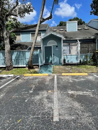 Rent this 2 bed loft on 1857 Racquet Court in North Lauderdale, FL 33068
