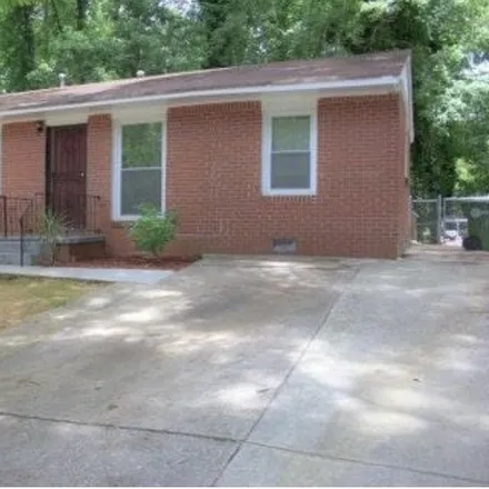 Buy this 4 bed house on 859 Sandy Creek Drive Northwest in Atlanta, GA 30331