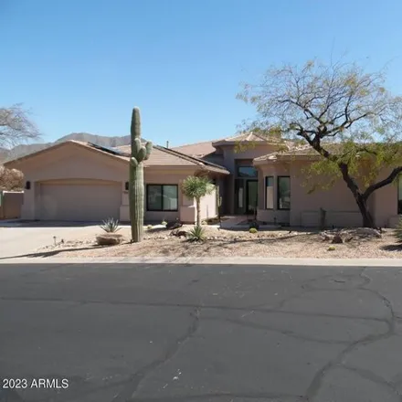 Rent this 4 bed house on 10694 East Firethorn Drive in Scottsdale, AZ 85255