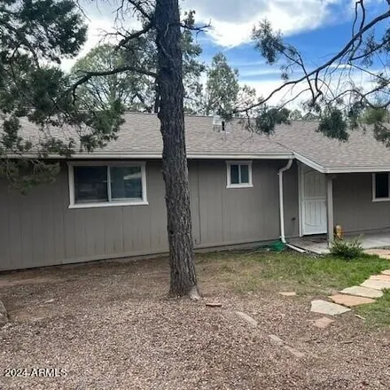 Buy this 4 bed house on 320 South 11th Avenue in Show Low, AZ 85901