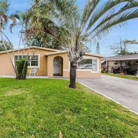 Buy this 3 bed house on 5878 Northeast 1st Avenue in Broward County, FL 33334