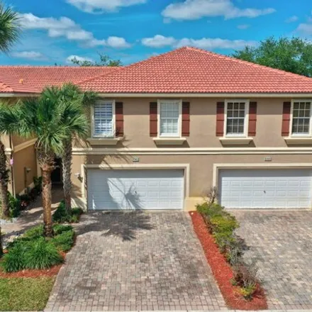 Buy this 3 bed townhouse on 4303 Bamboo Palm Court in Greenacres, FL 33463