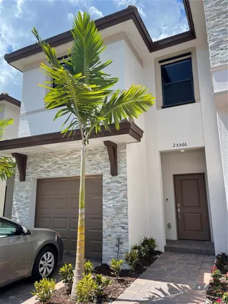 Rent this 3 bed townhouse on Southwest 108th Court in South Allapattah, Miami-Dade County