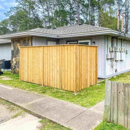 Rent this 2 bed house on 326 North Crow Road in Escambia County, FL 32506