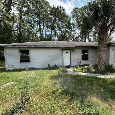 Buy this 3 bed house on 803 Kalif Avenue Southwest in Palm Bay, FL 32908