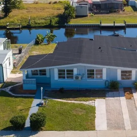 Rent this 4 bed house on 237 Duxbury Avenue Northeast in Port Charlotte, FL 33952