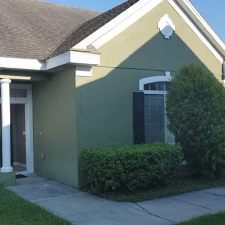 Rent this 3 bed townhouse on 2120 Island Walk Dr in Orlando, Florida