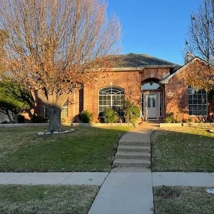 Rent this 4 bed house on 2404 Norwich Drive in Carrollton, TX 75006