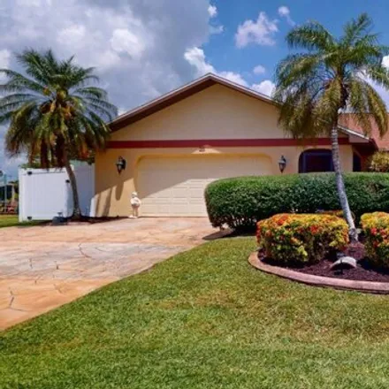 Buy this 3 bed house on 57 Southeast 12th Court in Cape Coral, FL 33990