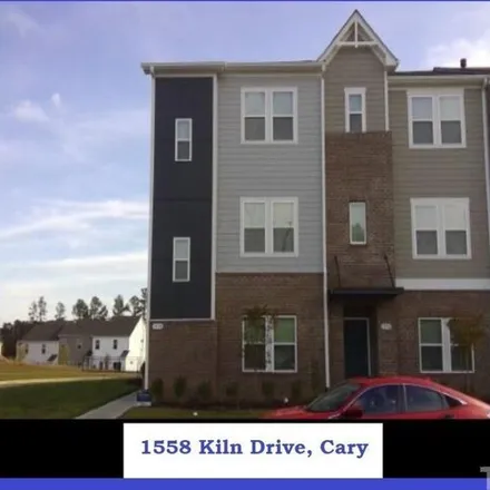 Rent this 4 bed townhouse on Kiln Ct. in Cary, NC 27519