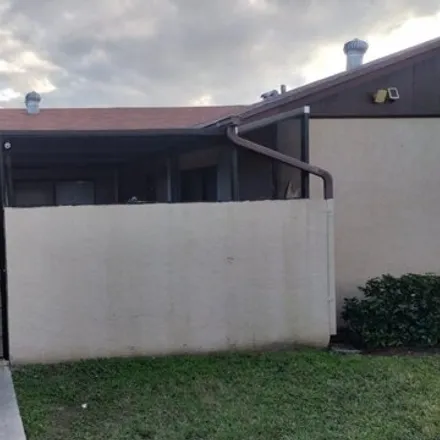 Rent this 2 bed townhouse on 4755 Sunny Palm Circle in Palm Beach County, FL 33415