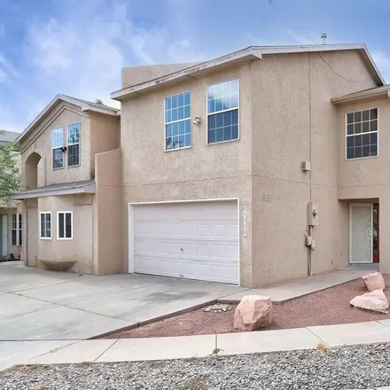 Buy this 3 bed townhouse on 1923 Amor Drive Northwest in Albuquerque, NM 87120