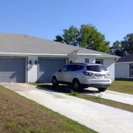 Buy this 6 bed house on 555 Piedmont Street in Lehigh Acres, FL 33974