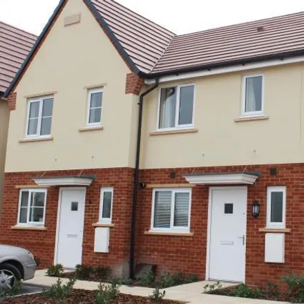 Rent this 2 bed townhouse on Greenfinch Road in Didcot, OX11 6BG