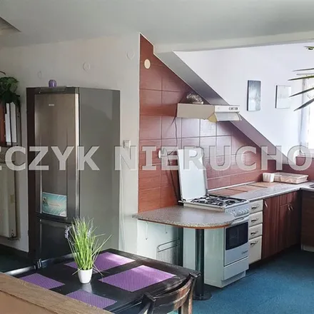 Rent this 4 bed apartment on Bratka 13 in 03-606 Warsaw, Poland