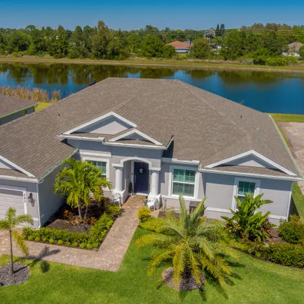Buy this 4 bed house on 393 Southwest Vista Lake Drive in Port Saint Lucie, FL 34953