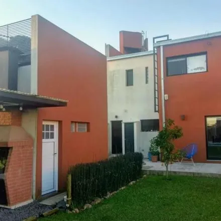 Buy this 3 bed house on Calle 12 in Villa Parque Sicardi, 1909 Buenos Aires