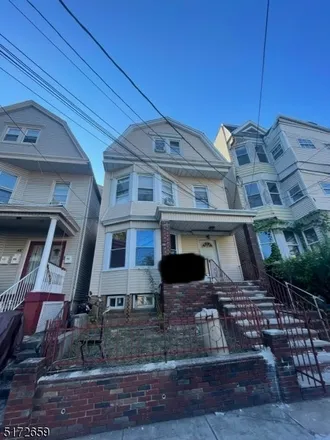 Buy this 6 bed townhouse on 241 Ellis Avenue in Irvington, NJ 07111