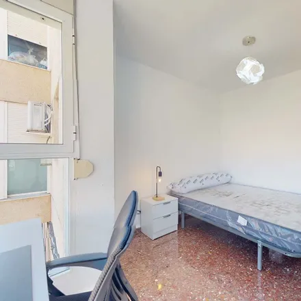 Rent this 4 bed room on Carrer de Vidal de Blanes in 12, 46024 Valencia