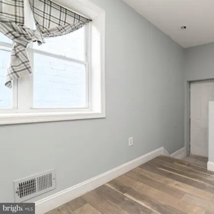 Image 4 - 2018 N Monroe St, Baltimore, Maryland, 21217 - House for sale