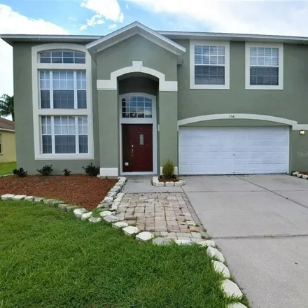 Rent this 4 bed house on 7522 Hunters Greene Drive in Polk County, FL 33810