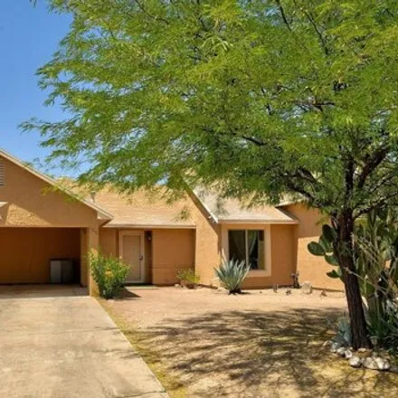 Buy this 4 bed house on 1398 North Echo Place in Tucson, AZ 85745
