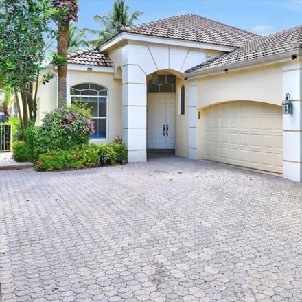 Rent this 3 bed house on Knightsbridge Lane in Palm Beach County, FL 33447